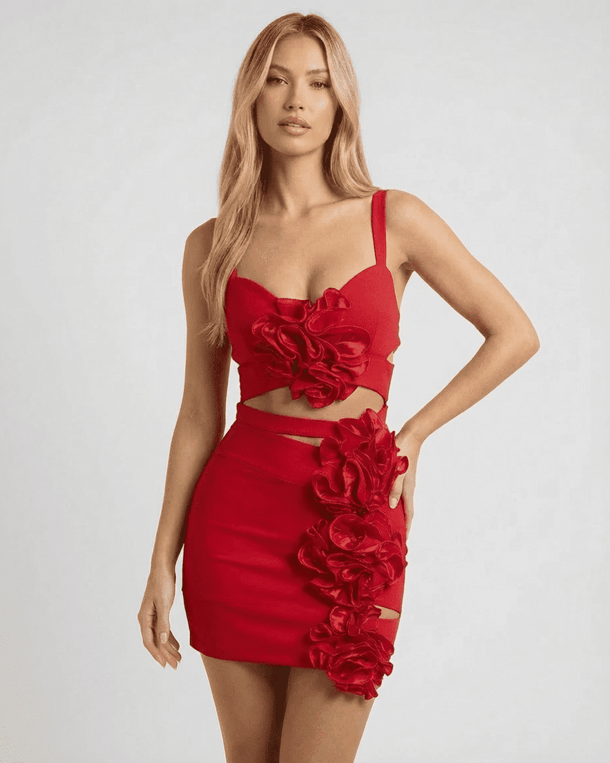 Valencia Mini Dress by SLIMONA featuring red cutout floral details and a bandage fit for a stunning look.