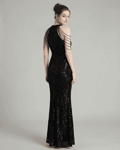 Vega Maxi Dress by SLIMONA featuring a stunning back view with sequins and shoulder detailing.