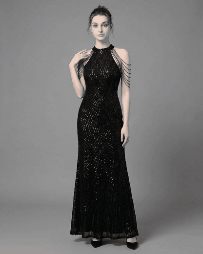 Vega Maxi Dress by SLIMONA showing a black sequined halter mermaid gown with elegant shoulder embellishments.