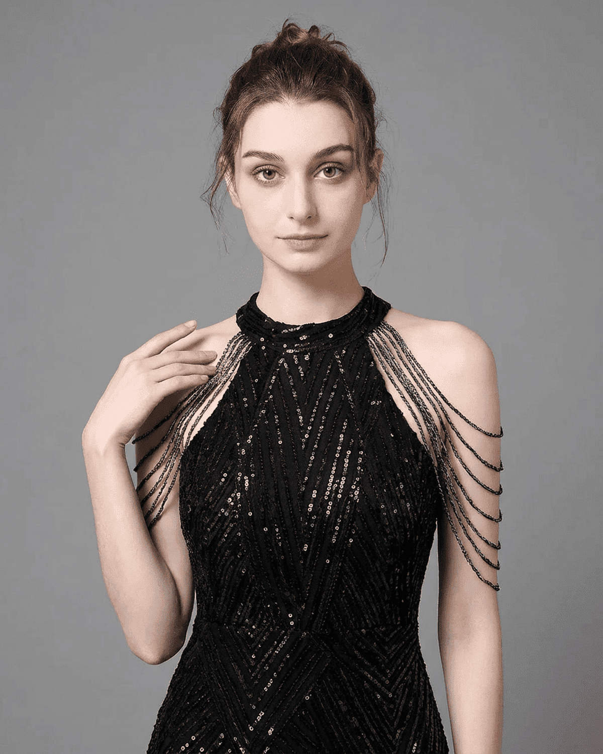 Vega Maxi Dress by SLIMONA featuring a sleeveless design and intricate sequin details, perfect for elegant occasions.