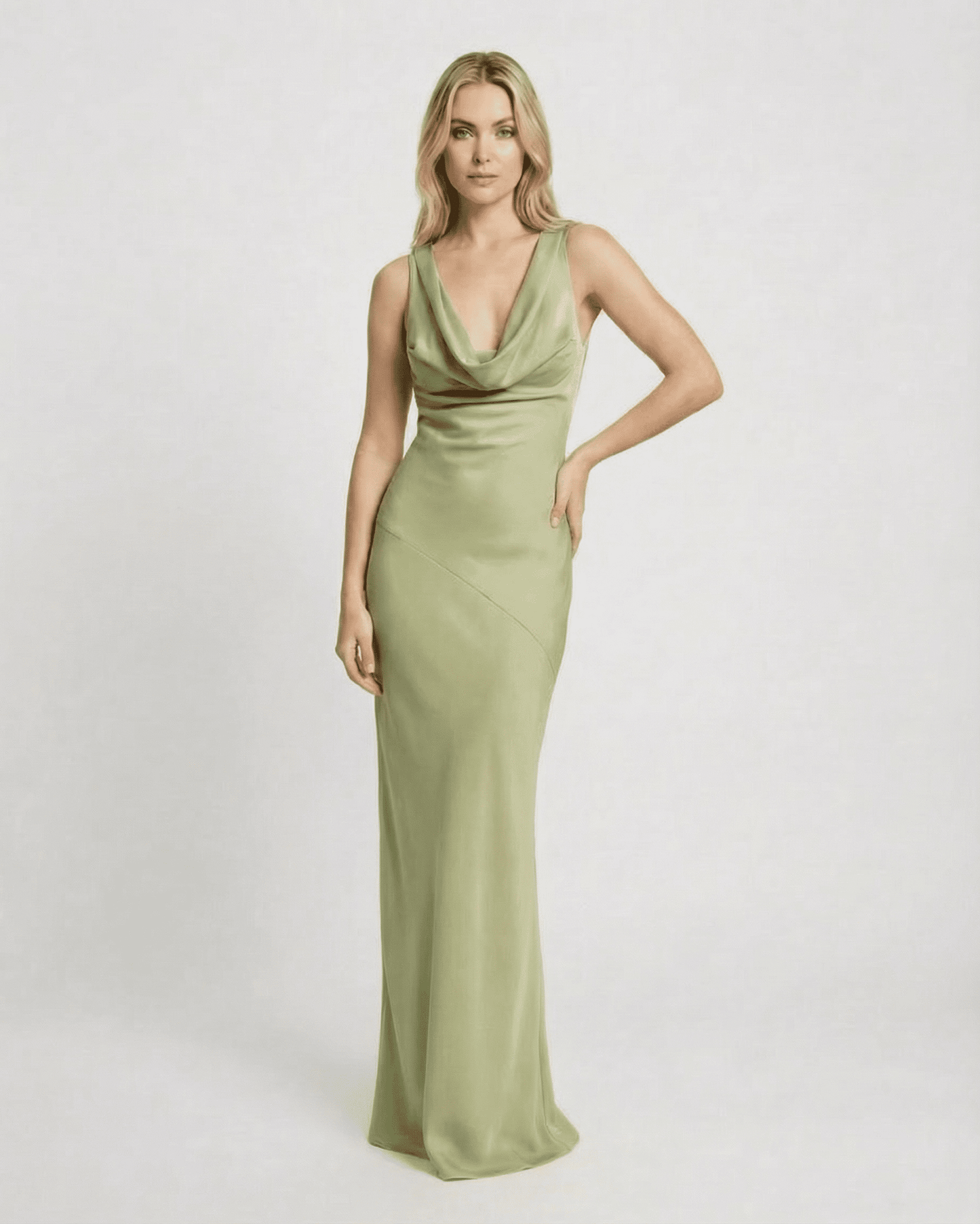 Verdant Maxi Dress by SLIMONA, a satin-effect sleeveless dress in soft green with a cowl neck and elegant floor-length silhouette.