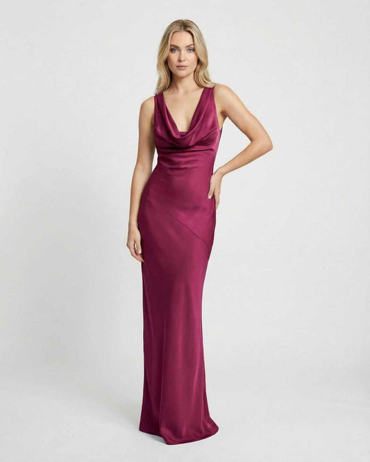 Stunning model showcasing the Verona Maxi Dress by SLIMONA, featuring a satin-effect cowl neck and elegant silhouette.
