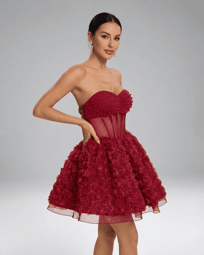 Verona Mini Dress by SLIMONA - Beaded strapless puff mini with 3D floral texture and dramatic volume in red.