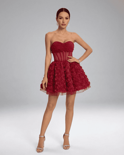 Verona Mini Dress by SLIMONA - Beaded strapless puff mini with 3D floral texture in rich red, perfect for special occasions.