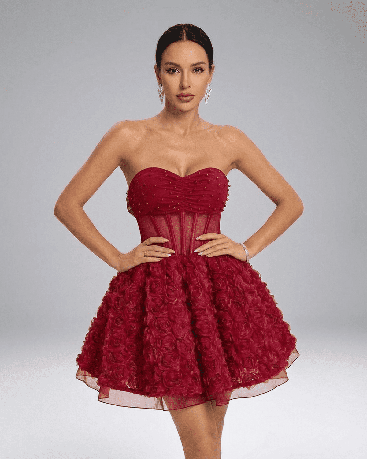 Verona Mini Dress by SLIMONA — Strapless red puff mini with beaded straps and 3D floral texture.