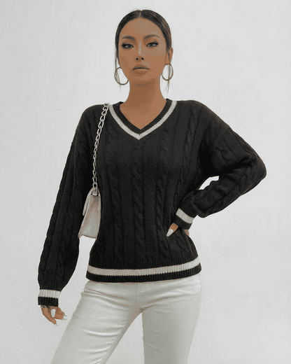Verona Sweater by SLIMONA featuring cable knit texture and V-neck design, perfect for stylish layering.
