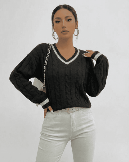 Verona Sweater by SLIMONA, featuring cable knit design and V-neck silhouette, perfect for stylish layering.