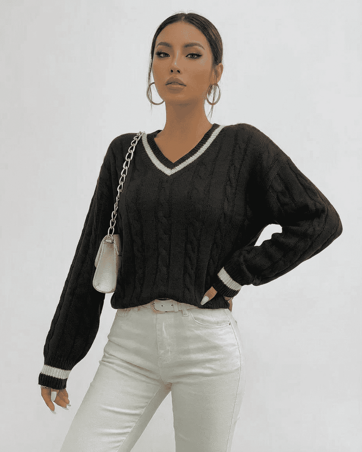 Verona Sweater by SLIMONA in cable knit with V-neck and stylish black color for modern layering.