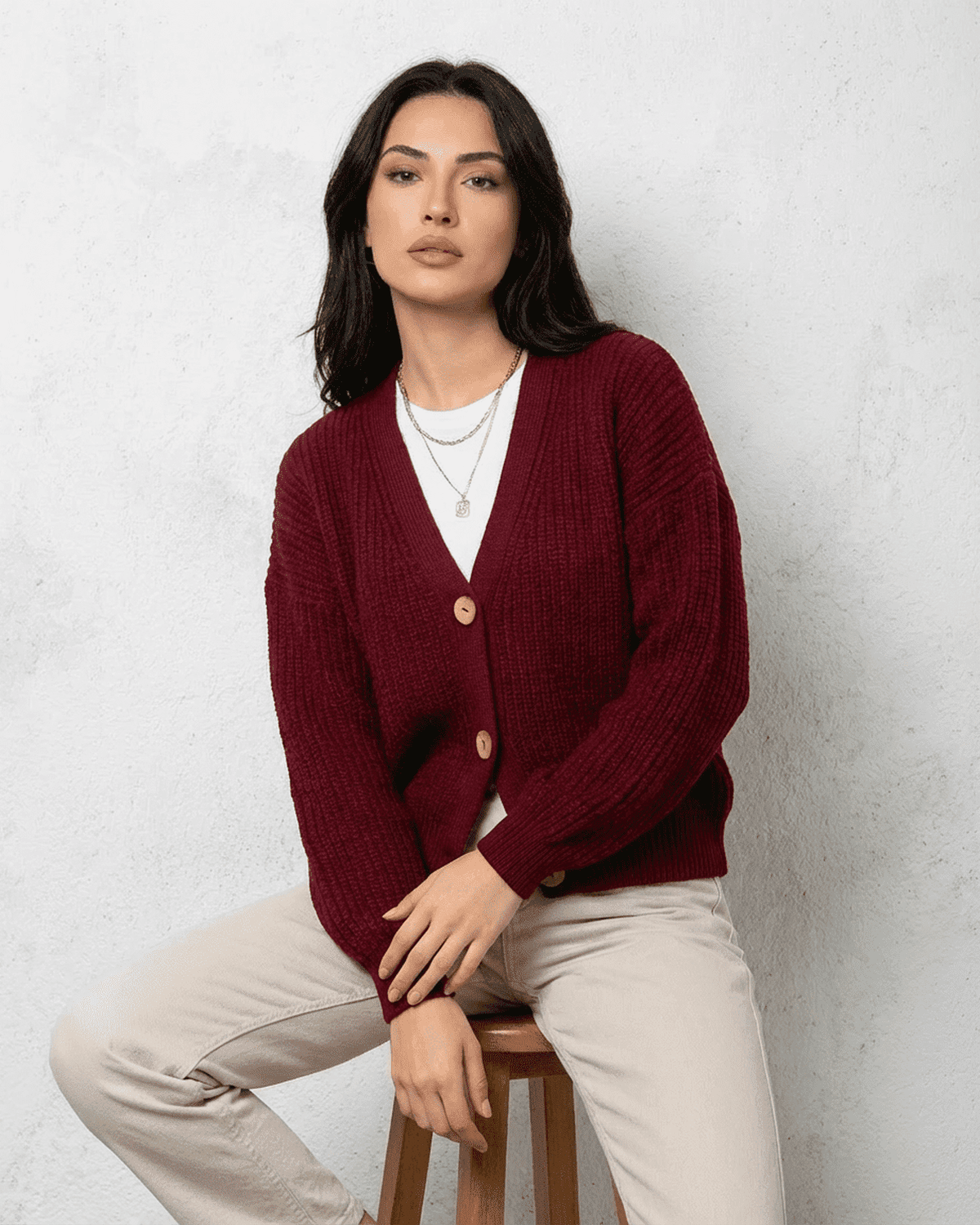 Vesper Cardigan - Luxurious burgundy knitwear from SLIMONA featuring a classic V-neck design.