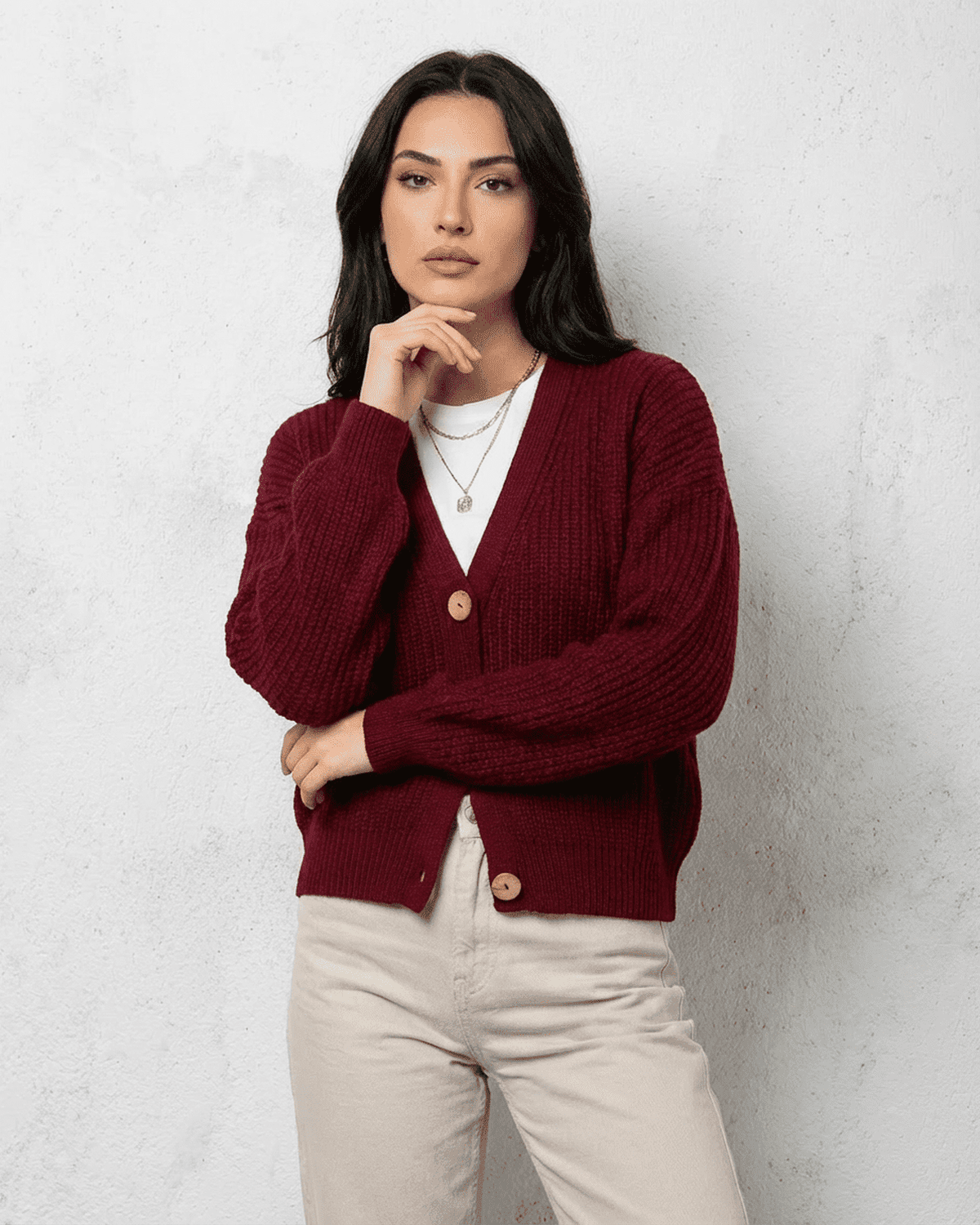 Vesper Cardigan by SLIMONA in luxurious burgundy knit, featuring a classic V-neck design and button closure.