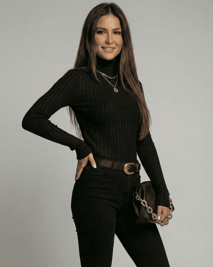 Vesper Sweater - Slimona ribbed turtleneck knitwear model in black, showcasing slim fit and elegant style.