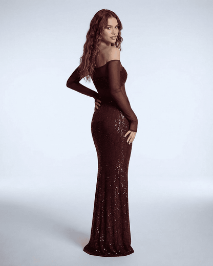 Virella Maxi Dress by SLIMONA - Elegant off-shoulder evening gown with deep red sequins and sheer mesh.