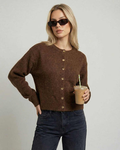 Cocoa Cardigan by Lauven worn by a woman with sunglasses, holding an iced coffee, showcasing a relaxed fit.