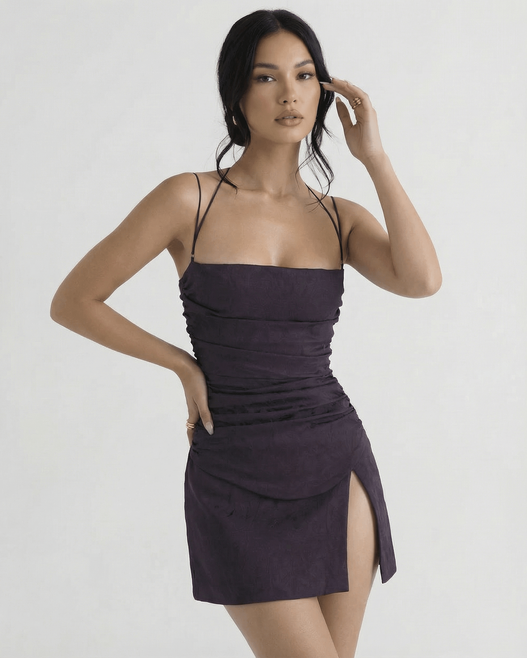 Noiré Mini Dress by Lauven – Elegant plum sheath mini dress with square neck and side slit, featuring soft ruched detailing.