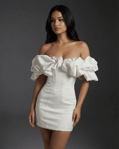 SLIMONA Celeste Mini Dress featuring boned structure and ruffle trim for a sleek, bodycon silhouette.
