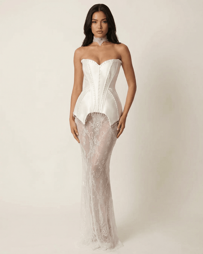 Elegant Lunaria Maxi Dress by SLIMONA featuring a strapless corset bodice and sheer lace patchwork skirt.