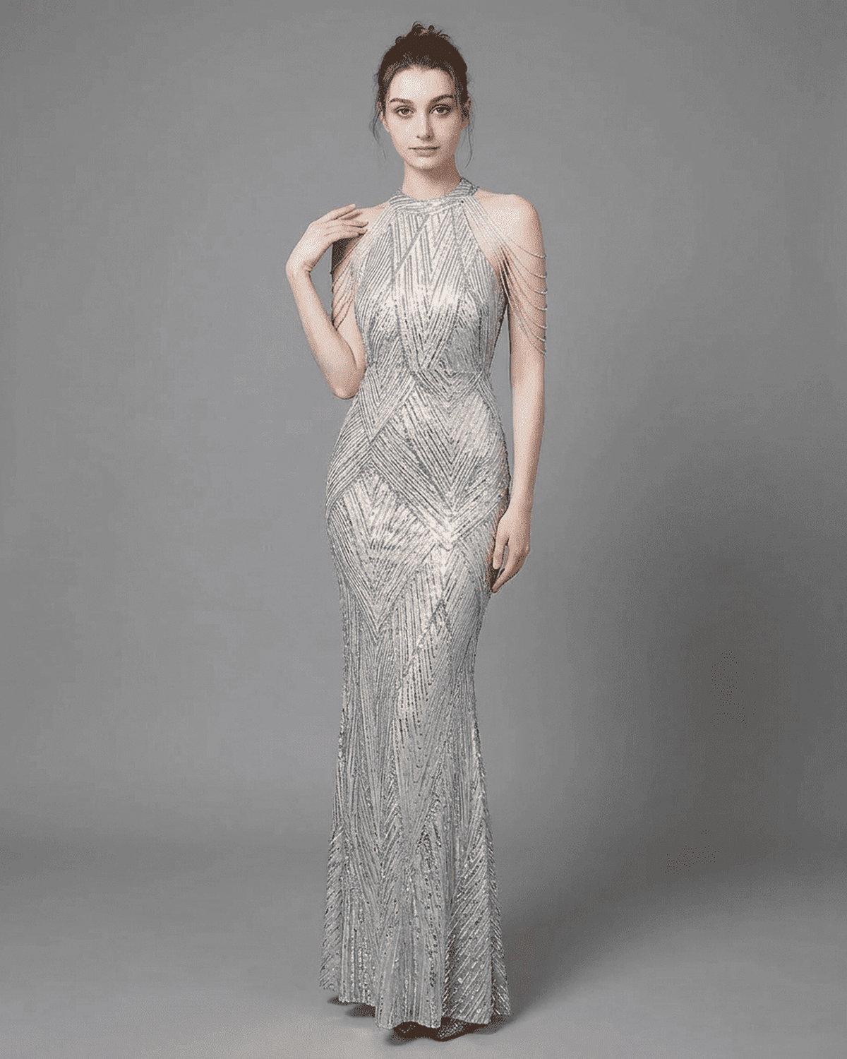 Luxe Maxi Dress by SLIMONA, silver velvet gown with sequin patterns, halter neckline, and beaded shoulder drapes.