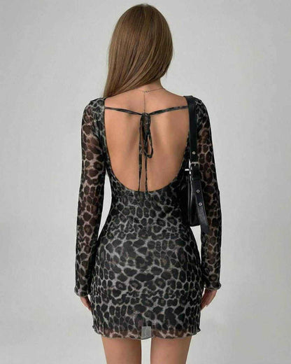 Lyra Mini Dress by Lauven featuring chic leopard print mesh design and elegant back detailing.