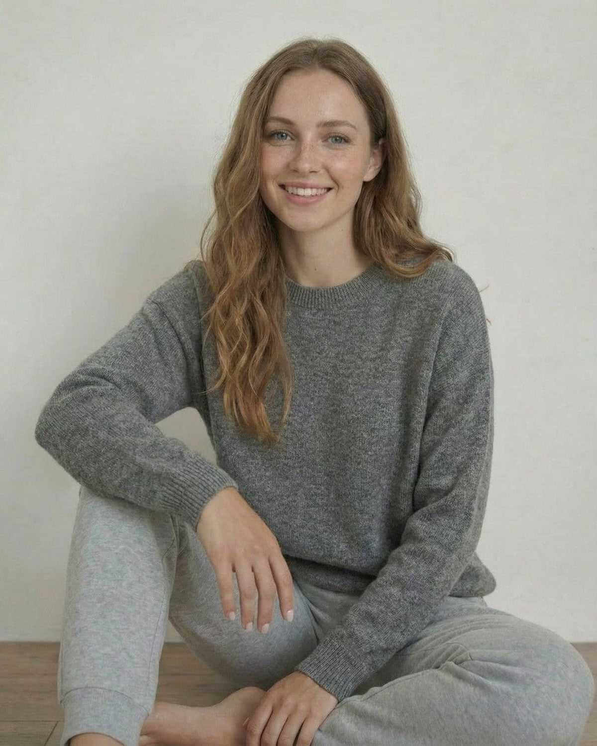 Lyra Pullover by SLIMONA, women's relaxed wool knit sweater in grey, offering breathability and comfort.