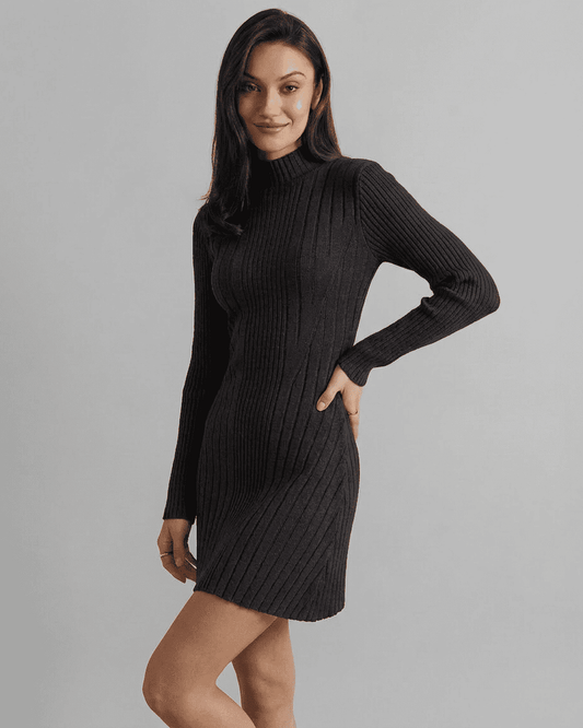 Model wearing the Milano Mini Dress by SLIMONA, showcasing its ribbed knit and mock neck design.