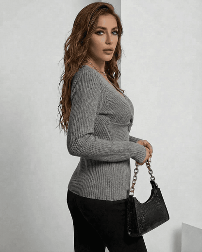 Nerina Pullover by SLIMONA - Elegant grey ribbed slim fit sweater with V-neck for a chic look.