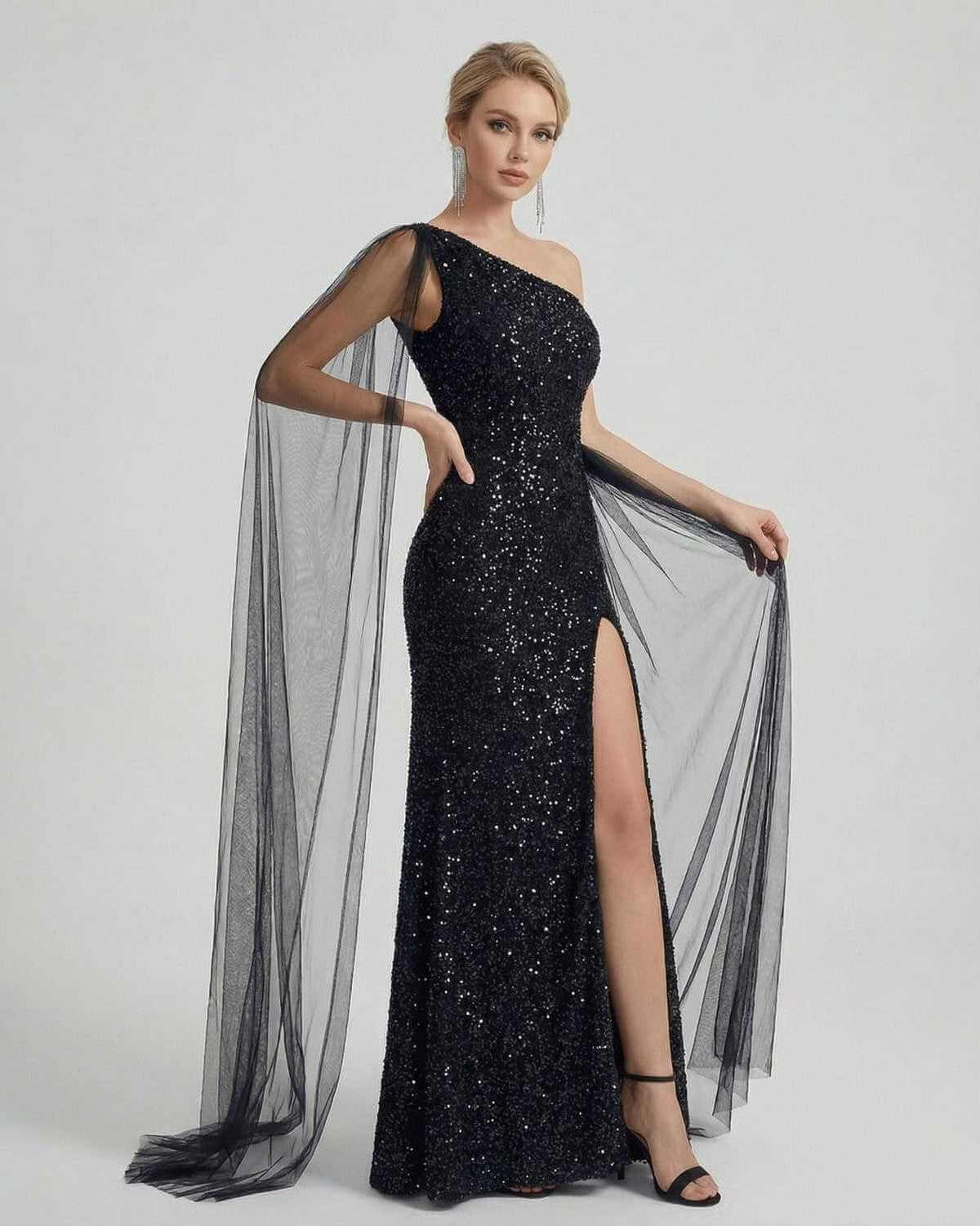 Nocturne Maxi Dress by SLIMONA, elegant one shoulder sequin dress with sheer mesh drape and thigh slit.