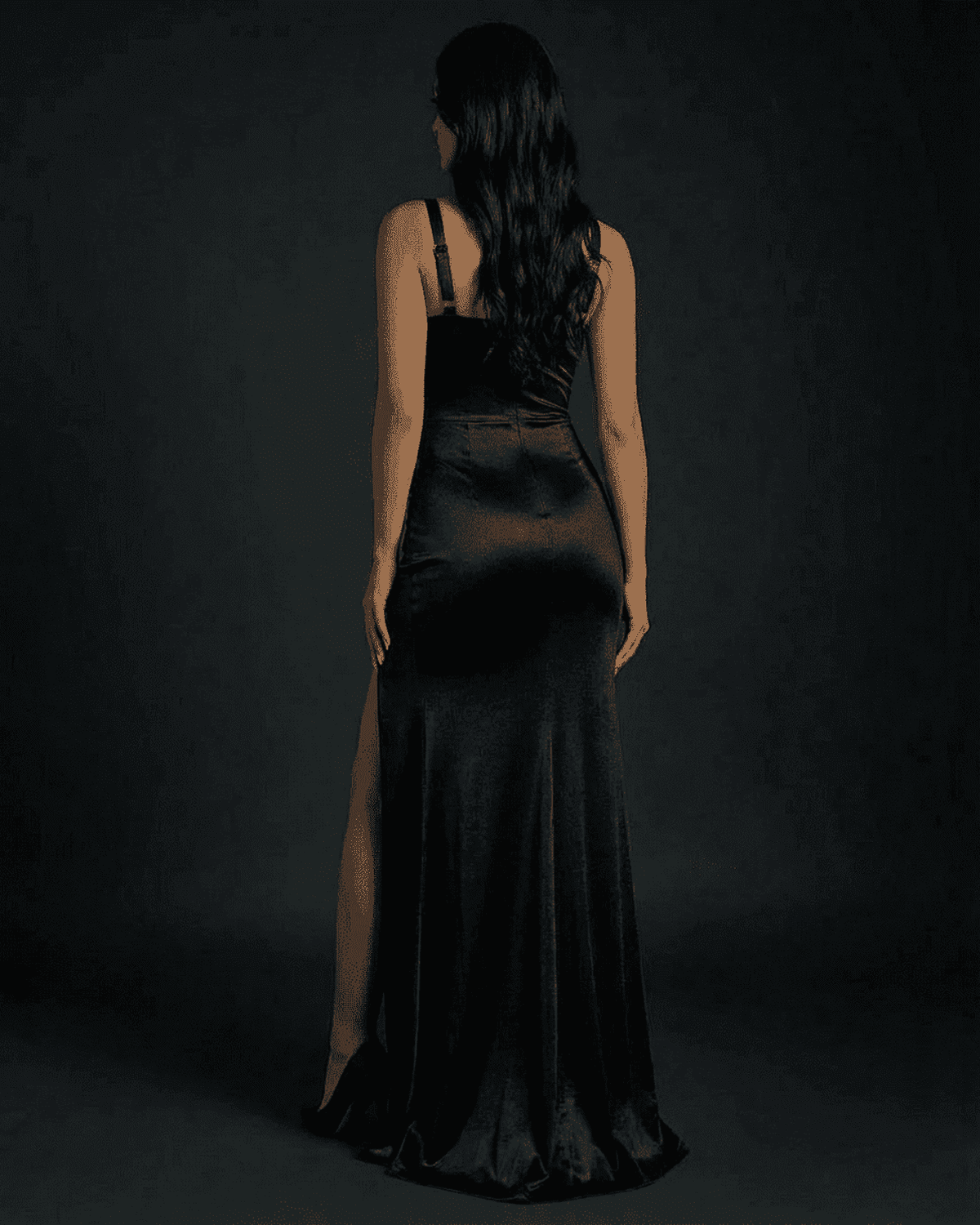 Elegant back view of the Nyx Maxi Dress by SLIMONA with a mermaid silhouette and alluring slit.