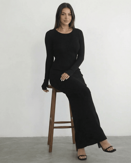 Nyx Maxi Dress by Lauven: Long sleeve black dress with open back, sleek silhouette, and ankle-length design.