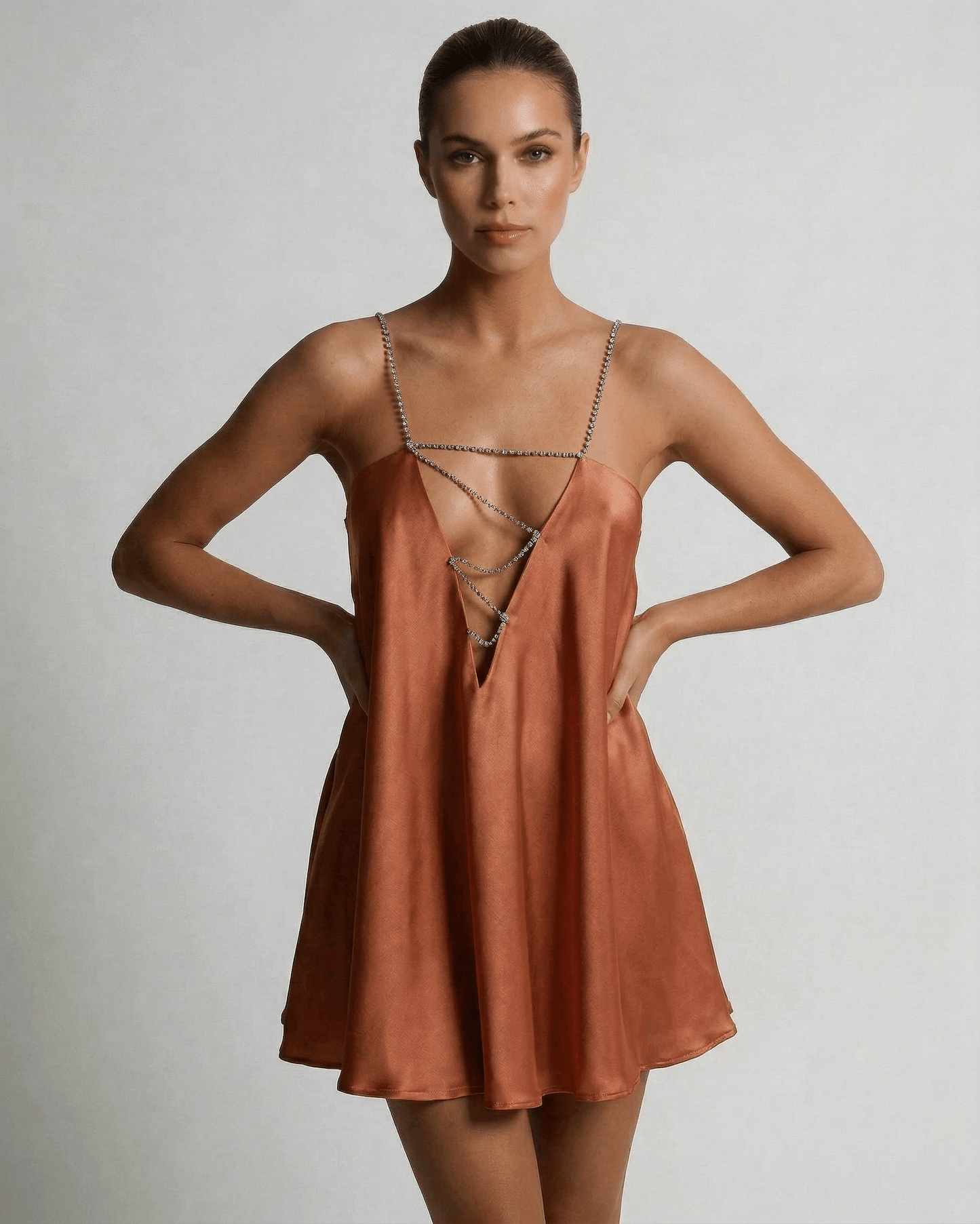 Copper Mini Dress by Lauven, luxurious satin A-line design with rhinestone detail, sleeveless, warm copper tone.