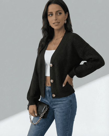 Orion Cardigan by SLIMONA, featuring a stylish black design with long sleeves and button front, perfect for layering.
