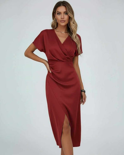 Orion Midi Dress by Lauven in deep red featuring wrap design, V-neckline, and subtle front slit.