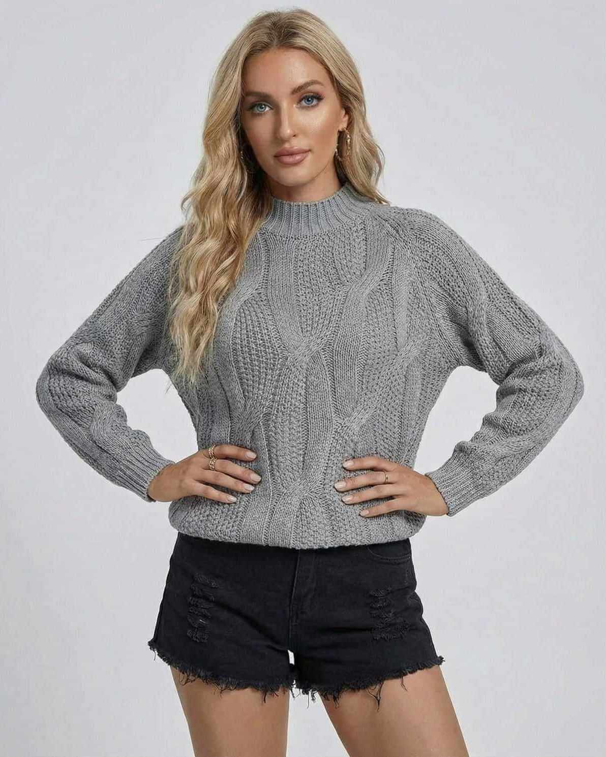 Orion Sweater from Lauven, a women’s cable-knit ribbed sweater in gray, perfect for fall and winter styling.