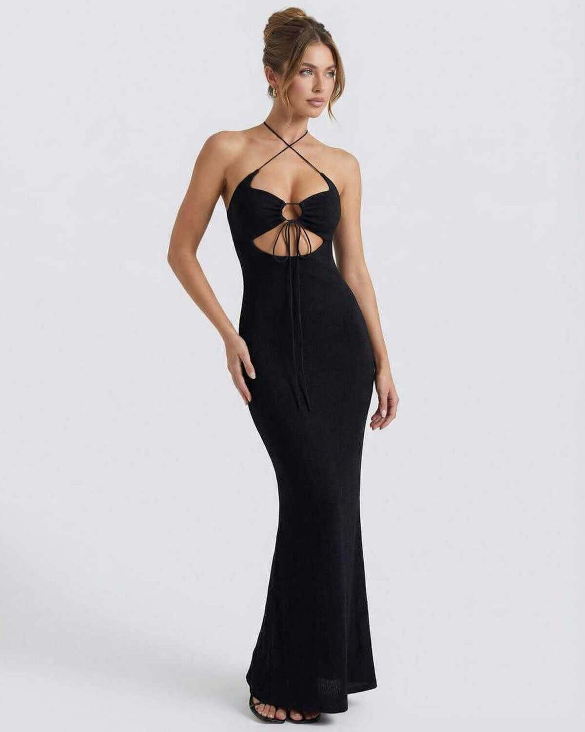 Vesper Maxi Dress by Lauven - Sleek black knitted halter neck with intricate cutouts for a stylish evening look.
