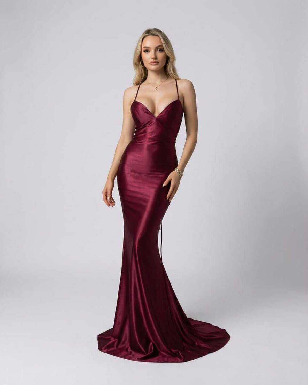 Marcelline Maxi Dress by Lauven - Luxurious burgundy satin evening gown with spaghetti straps and deep V-neckline.