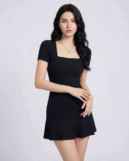 Hera Mini Dress by Lauven in sleek black, showcasing a smooth sheath silhouette with a square neckline and short sleeves.