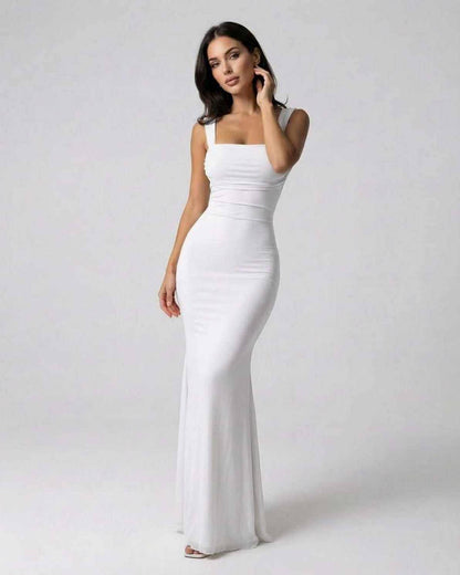 Ivory Maxi Dress by Lauven featuring a slim fit, ankle-length silhouette, and elegant strappy back design.
