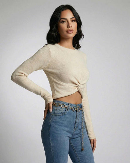 Sahara Pullover by Lauven – Women’s beige knit pullover with knotted front detail and modern silhouette.