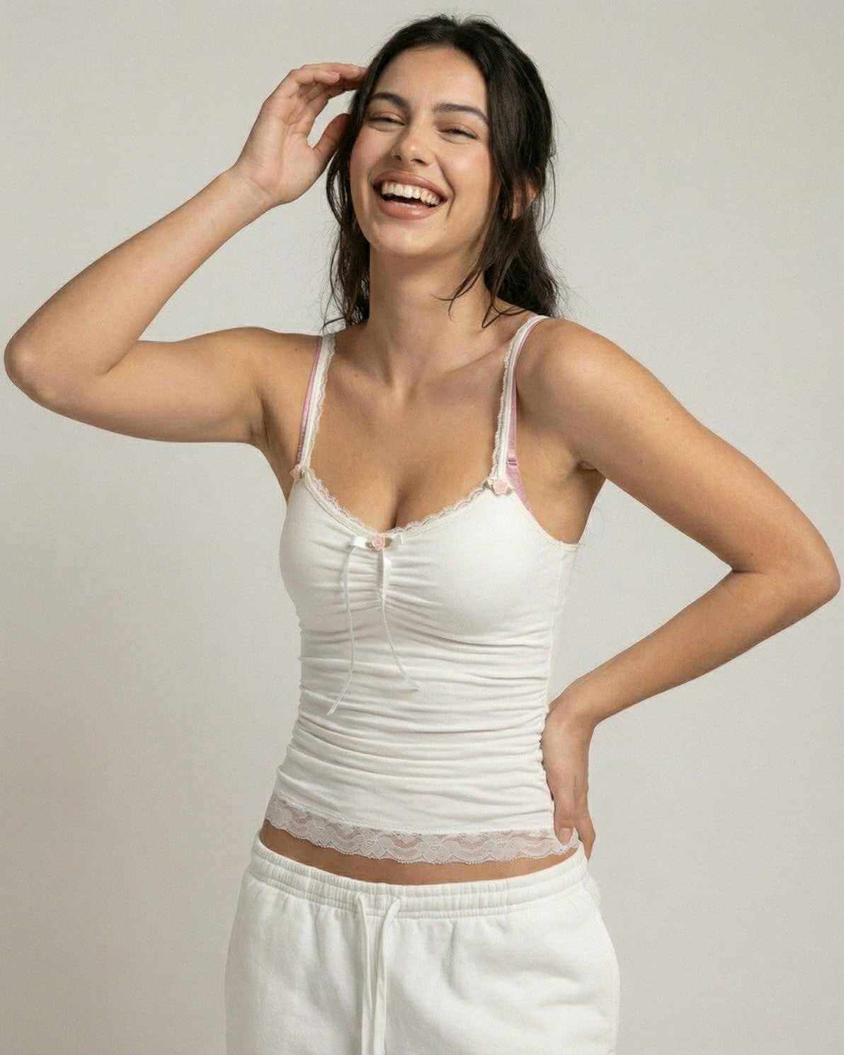 Lunelle Top by Lauven – soft ivory lace trim camisole with bow detail, showcasing feminine elegance.