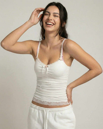 Lunelle Top by Lauven – soft ivory lace trim camisole with bow detail, showcasing feminine elegance.