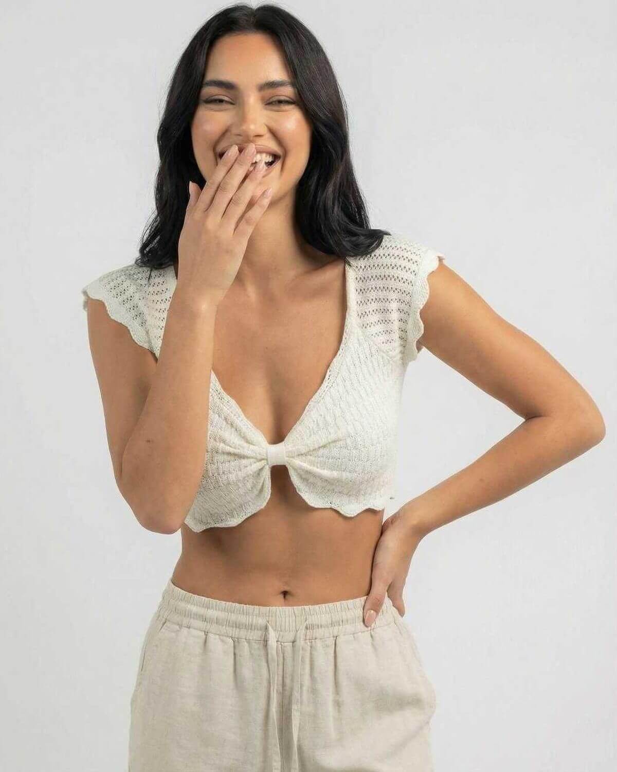 Calista Top by Lauven - Elegant women’s cotton knit top with lettuce trim and v-neck, perfect for warm weather.