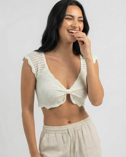 Calista Top by Lauven, a women’s cotton knit top with lettuce trim and V-neck style.