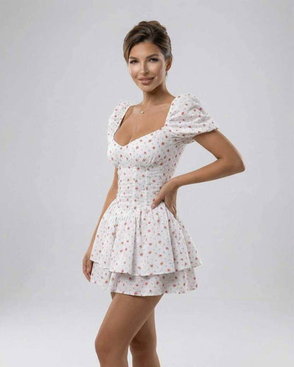 Florence Mini Dress by Lauven featuring a floral print and puff sleeves, perfect for a romantic summer look.