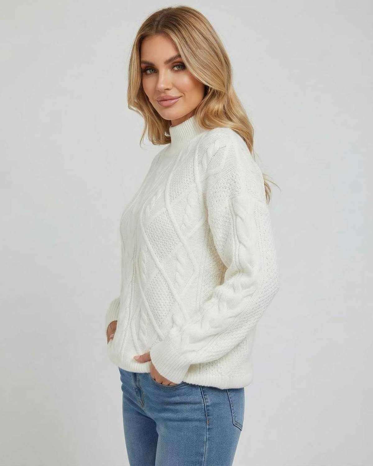 Women wearing the Sienna Sweater by Lauven, featuring an oversized cable knit design in white.