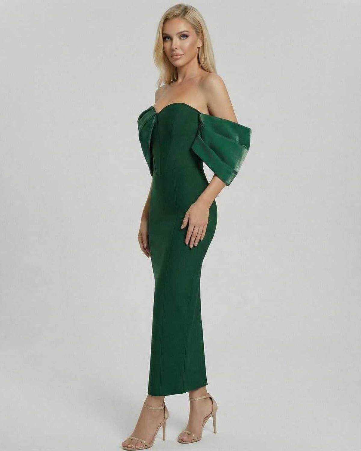 Verona Midi Dress by Lauven showcased on a model, featuring elegant off shoulder design in green.