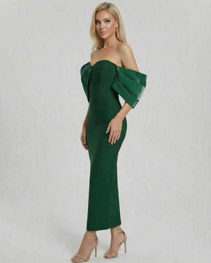Verona Midi Dress by Lauven showcased on a model, featuring elegant off shoulder design in green.