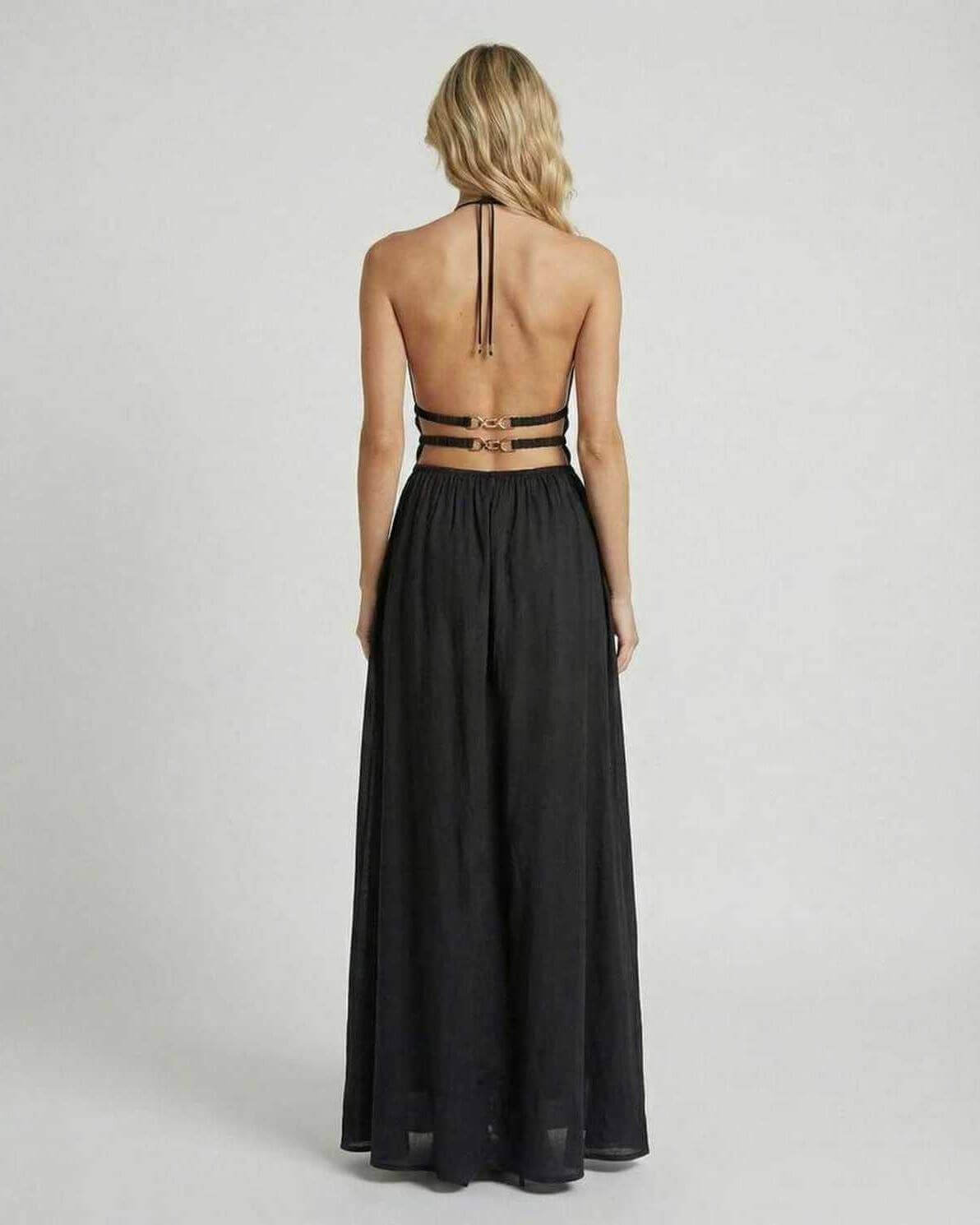 Celeste Maxi Dress by Lauven – Elegant back view showcasing the sleek black silhouette and halter neck design.