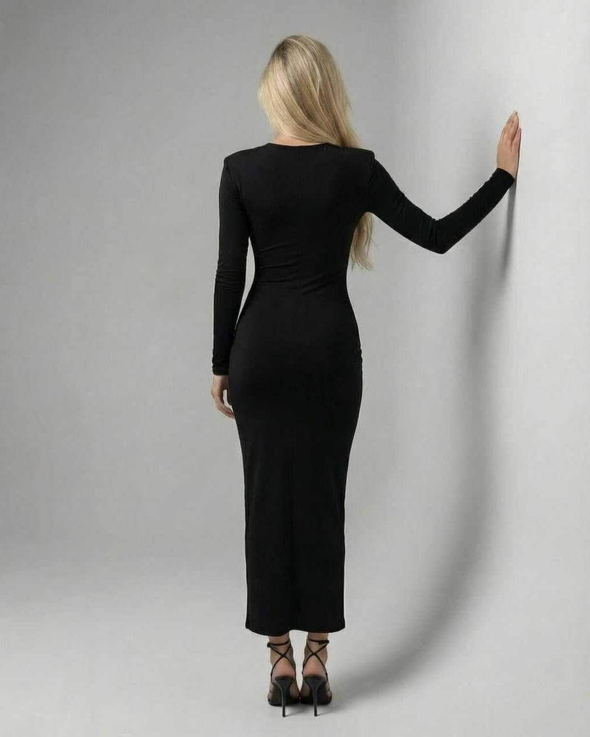 Elara Midi Dress by Lauven, sleek black sheath dress showcasing a slim fit silhouette from the back.