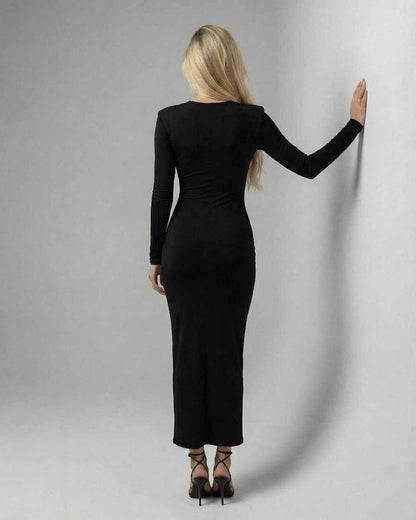 Elara Midi Dress by Lauven, sleek black sheath dress showcasing a slim fit silhouette from the back.