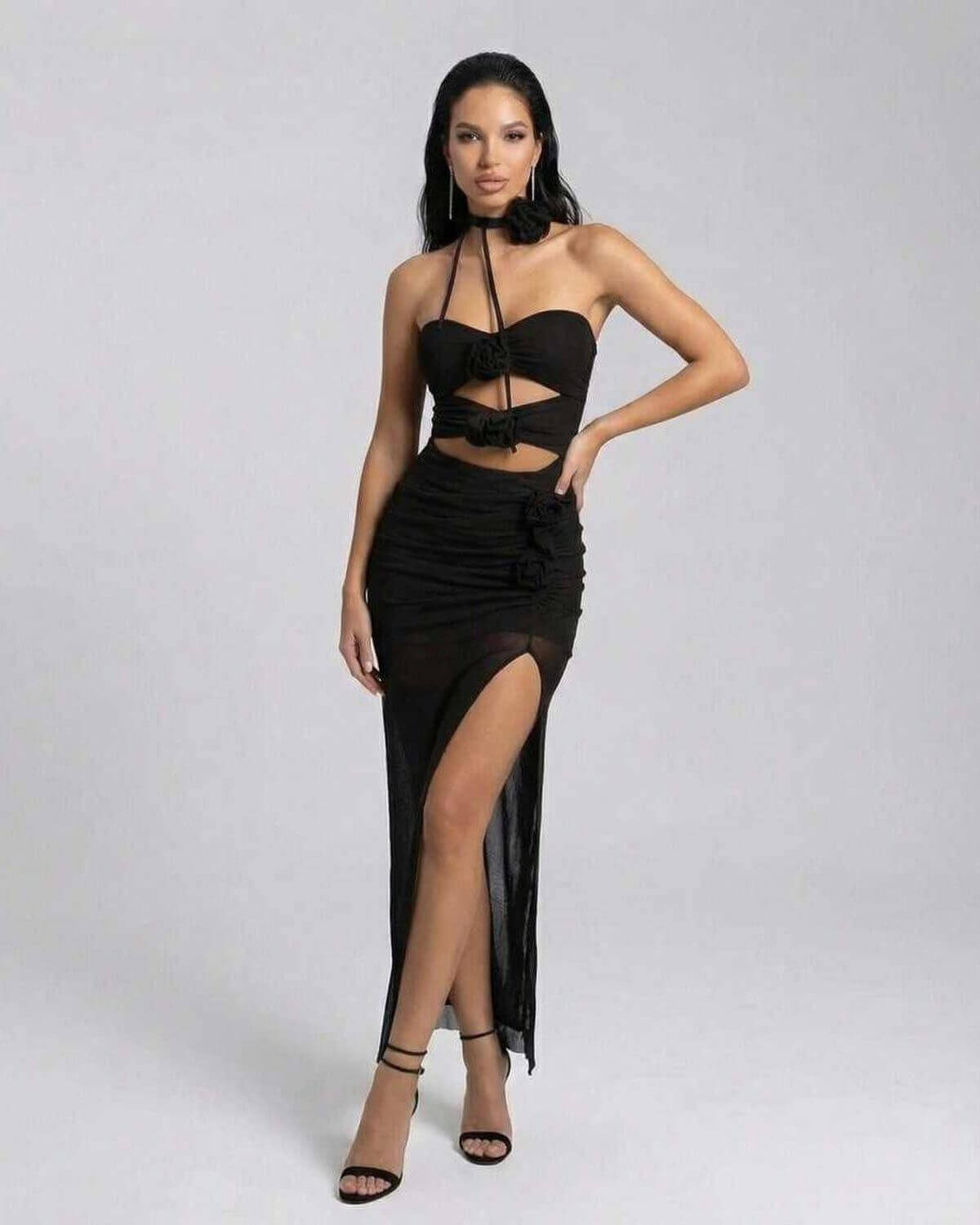 Nerina Maxi Dress by Lauven, elegant black halter neck knitted dress with high stretch and sexy cutout design.