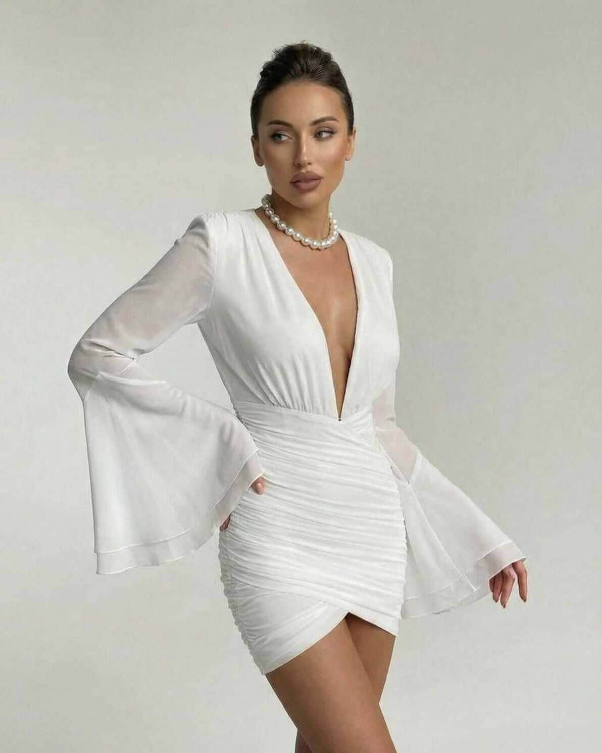 Celeste Mini Dress by Lauven, elegant V-neck sheath with dramatic sleeves in white fabric.
